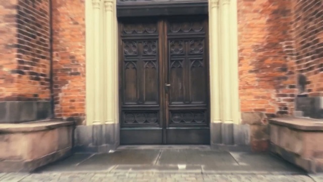 Video Reference: property, brickwork, wall, door, brick, home, architecture, window, facade, alley, Person