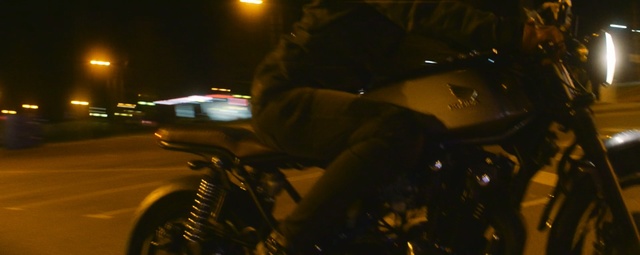 Video Reference: land vehicle, car, night, yellow, darkness, light, motorcycle, vehicle, lighting, reflection