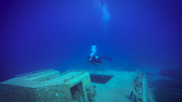 Video Reference: underwater, sea, diver, coral, fish, ocean, reef, scuba diver, diving, water, marine, tropical, aquatic, ship, explorer, animal, scuba, sun