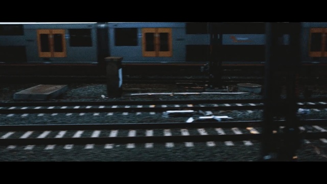 Video Reference: darkness, screenshot, atmosphere, sky, night, track, midnight, font, rolling stock, computer wallpaper