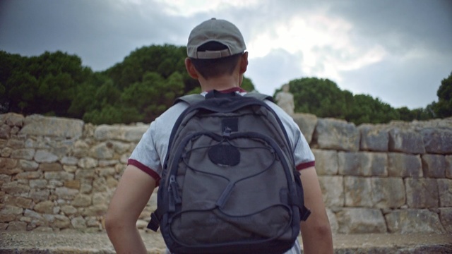 Video Reference: Shoulder, Wall, Travel, Joint, Outerwear, Backpack, Tourism, Vacation, Neck, Personal protective equipment