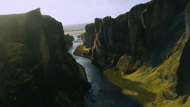 Video Reference: cliff, rock, water, terrain, escarpment, formation, watercourse, highland, coast, geology