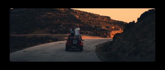 Video Reference: Vehicle, Mode of transport, Sky, Landscape, Automotive design, Road, Road trip, Car, Asphalt, Badlands