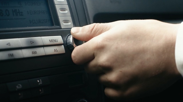 Video Reference: car, technology, electronic device, vehicle, electronics, automotive design, vehicle door, motor vehicle, multimedia, center console, Person