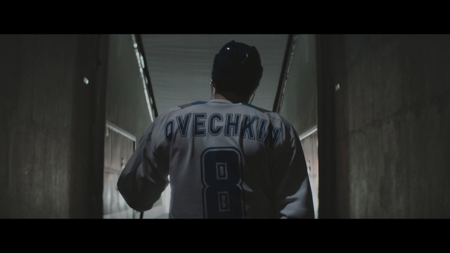 Video Reference: ballplayer, athlete, player, contestant, person, helmet, football helmet, man, black