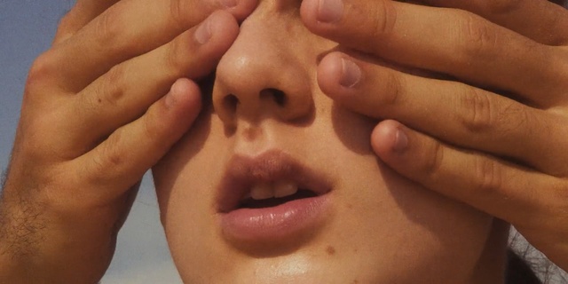 Video Reference: face, skin, nose, chin, cheek, lip, close up, forehead, finger, hand, Person
