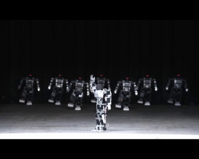 Video Reference: Black, Performance, Darkness, Performance art, Performing arts, Stage, Event, Robot, Black-and-white, Photography