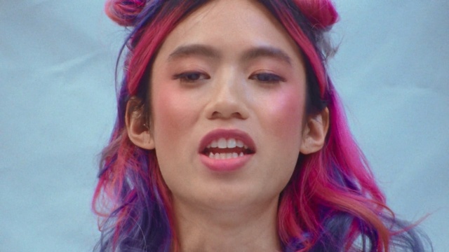 Video Reference: Face, Hair, Eyebrow, Lip, Pink, Nose, Hair coloring, Cheek, Forehead, Facial expression, Person