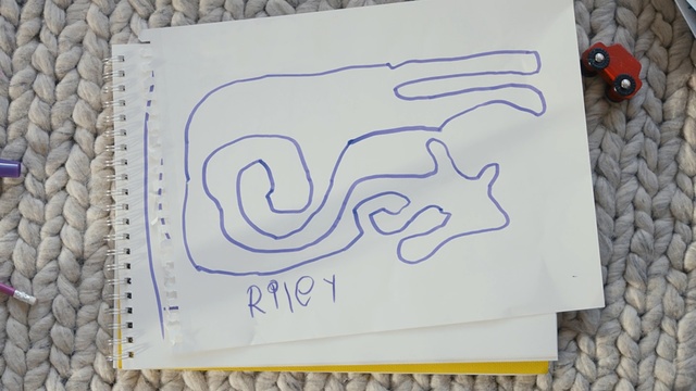 Video Reference: blue, text, font, design, material, paper, art, calligraphy, product, drawing, Person