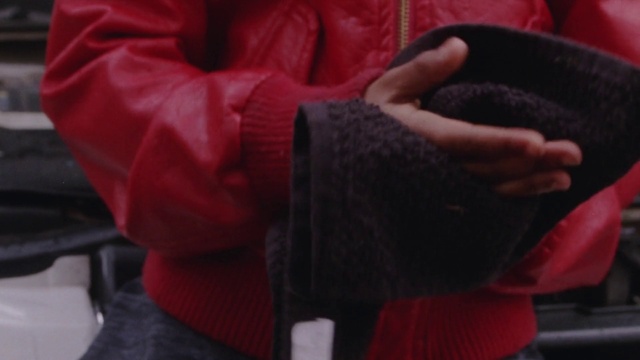 Video Reference: Red, Footwear, Jacket, Leg, Outerwear, Arm, Hand, Finger, Wool, Leather