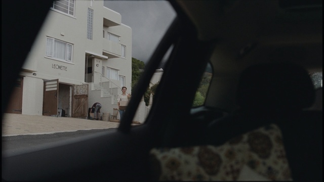 Video Reference: infrastructure, architecture, urban area, wall, house, car, window, street, building, sky, Person