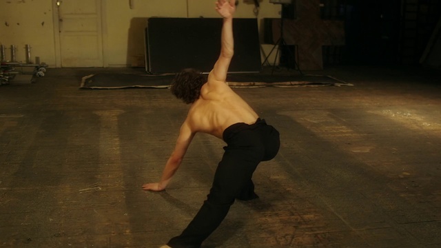 Video Reference: Dancer, Modern dance, Performance art, Arm, Dance, Leg, Floor, Human body, Choreography, Performing arts, Person, Young, Man, Front, Black, Woman, Playing, Standing, Holding, Night, Jumping, Frisbee, Air, White, Cat, Catch, Room, Doing, Clothing, Physical fitness, Yoga, Knee, Yoga pant, Balance, Ballet dancer, High heels, Footwear