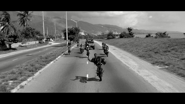 Video Reference: Motor vehicle, Cycling, Road, Vehicle, Mode of transport, Road cycling, Black-and-white, Bicycle, Photography, Asphalt