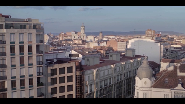 Video Reference: city, urban area, skyline, sky, cityscape, metropolis, residential area, town, landmark, skyscraper, Person