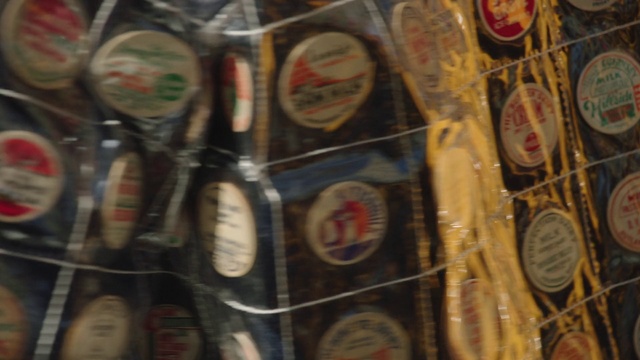 Video Reference: Drink, Beer, Indoor, Filled, Different, Bunch, Many, Various, Display, Items, Food, Covered, Full, Displayed, Variety, Store, Several, Group, Row, Table, Room, Stacked, Text, Soft drink, Sale