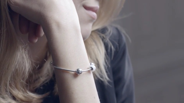 Video Reference: Jewellery, Neck, Lip, Fashion accessory, Cheek, Blond, Bracelet, Hand, Finger, Ear