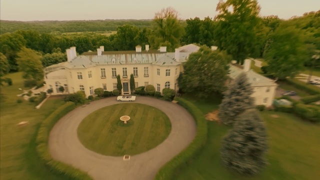 Video Reference: estate, property, mansion, stately home, aerial photography, grass, national trust for places of historic interest or natural beauty, tree, bird eye view, château