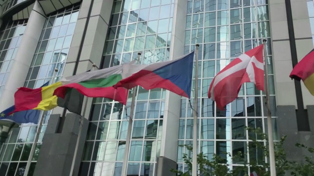 Video Reference: Flag, Architecture, Commercial building, Building, Metropolitan area, Facade, Real estate, Daylighting, Window, Window film