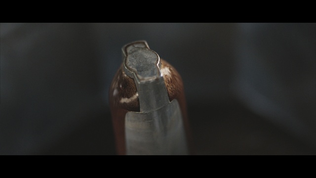 Video Reference: Glass bottle, Brown, Joint, Photography, Still life photography, Close-up, Stock photography, Hand, Finger, Bottle