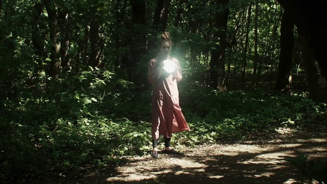 Video Reference: People in nature, Nature, Sunlight, Photograph, Natural environment, Tree, Light, Forest, Vegetation, Woodland, Outdoor, Man, Park, Game, Throwing, Standing, Wood, Frisbee, Dirt, Young, Area, Holding, Green, Playing, Field, Walking, Woman, Riding, White, Ground, Clothing, Person, Plant, Wooded