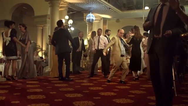 Video Reference: Event, Crowd, Ceremony, Function hall, Room, Flooring, Gentleman, Aisle, Wedding reception, Ballroom, Person