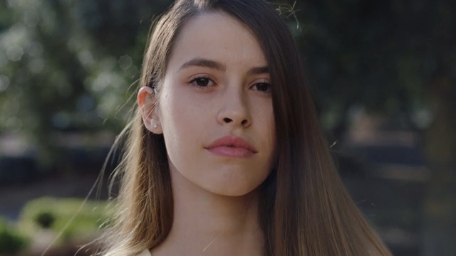 Video Reference: face, beauty, human hair color, eyebrow, lady, girl, hairstyle, cheek, black hair, blond, Person