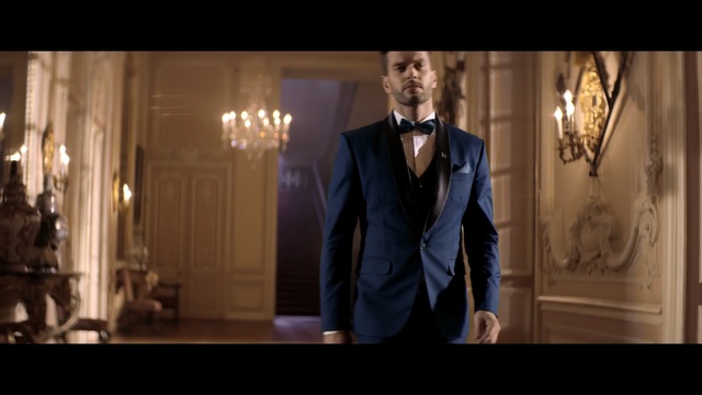 Video Reference: Suit, Formal wear, Tuxedo, Clothing, Gentleman, Male, Fashion, Dress, Groom, Photography, Person