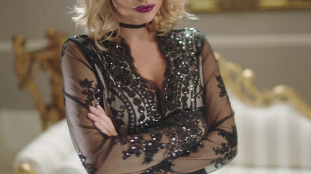 Video Reference: Clothing, Dress, Fashion, Blond, Sleeve, Outerwear, Fashion model, Beige, Fashion accessory, Neck