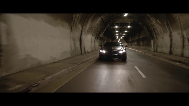 Video Reference: Tunnel, Automotive design, Mode of transport, Vehicle, Car, Road, Infrastructure, Automotive lighting, Lane, Performance car