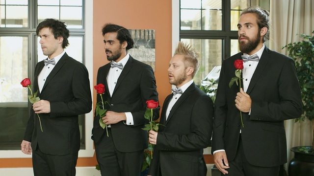 Video Reference: suit, formal wear, tuxedo, event, businessperson, Person