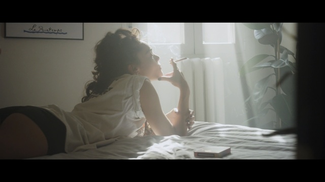 Video Reference: photograph, girl, lady, sitting, light, snapshot, human, screenshot, sunlight, darkness