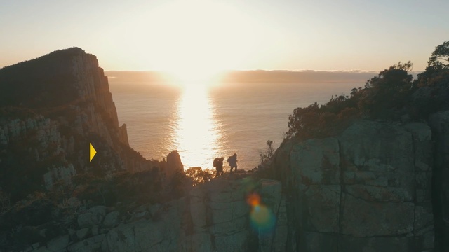 Video Reference: sky, sun, sunrise, morning, terrain, cliff, geological phenomenon, sunlight, sunset, rock