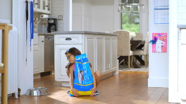 Video Reference: room, floor, product, furniture, flooring, home, child, toddler, house, interior design, Person