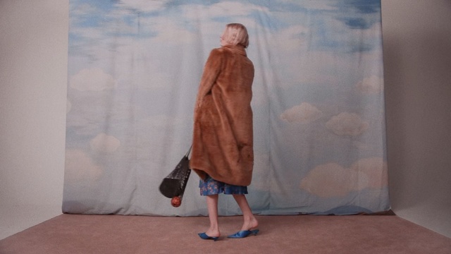 Video Reference: Clothing, Fashion, Brown, Outerwear, Textile, Dress, Linens, Beige, Shoe, Fur