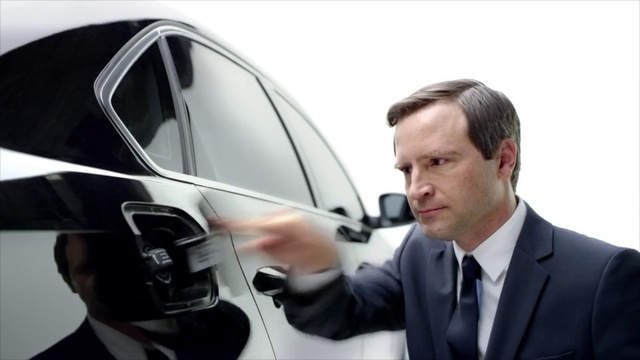 Video Reference: Automotive design, Motor vehicle, Vehicle door, Vehicle, Car, Suit, Wheel, City car, Businessperson, Person