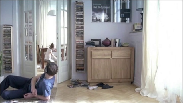 Video Reference: Room, Furniture, Floor, Property, Interior design, Flooring, Door, Bed, Hardwood, Living room