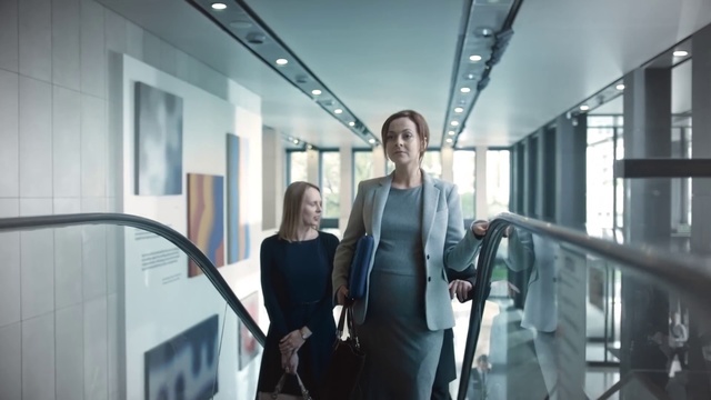 Video Reference: Shoulder, Standing, Interior design, Architecture, White-collar worker, Escalator, Leisure, Building, Travel