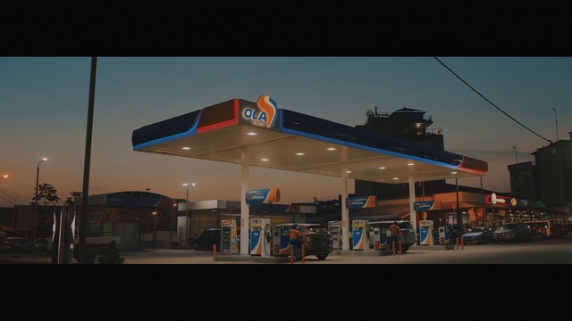 Video Reference: Filling station, Building, Business, Sky, Night, Architecture, Gasoline, Glass, Organization, Gas