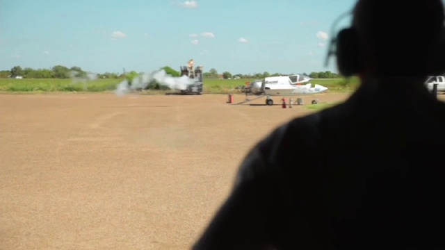 Video Reference: Road, Grass, Sky, Asphalt, Rural area, Tree, Landscape, Soil, Vehicle, Land lot