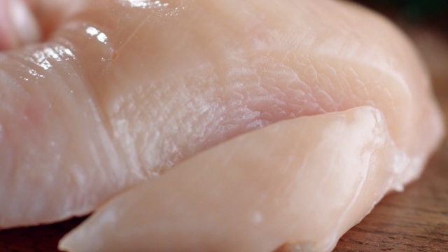 Video Reference: animal fat, close up, fish slice, chicken breast, flesh, finger, animal source foods, recipe