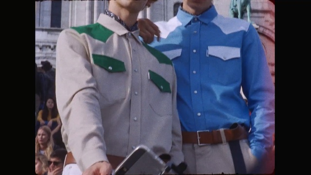 Video Reference: jacket, shirt, outerwear, dress shirt, sleeve, fashion, suit, gentleman, t shirt, formal wear, Person