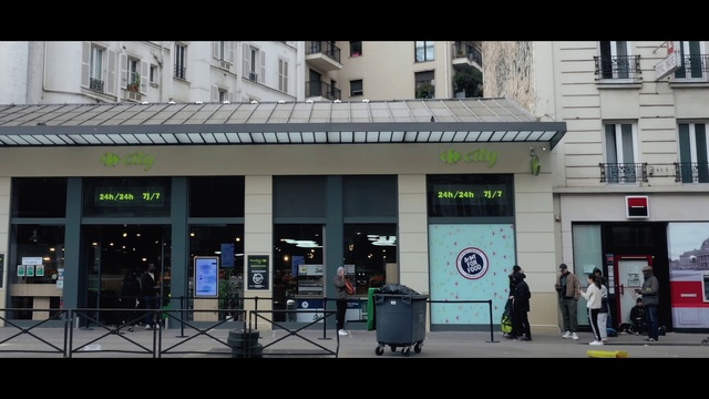Video Reference: Building, Architecture, Facade, Street, City, House, Plant, Window, Pedestrian, Advertising