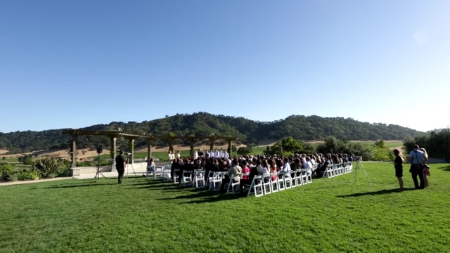 Video Reference: mountainous landforms, grassland, tree, grass, plant, outdoor recreation, hill station, pasture, mountain range, recreation, Person