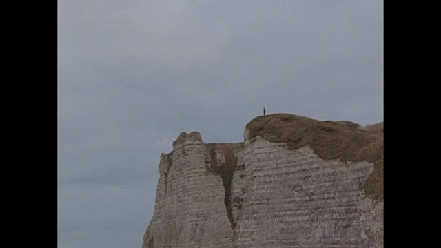 Video Reference: Rock, Cliff, Terrain, Sky, Formation, Klippe, Historic site, Person