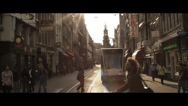 Video Reference: Street, Town, Pedestrian, Urban area, Metropolis, Neighbourhood, Mode of transport, Metropolitan area, Road, Human settlement