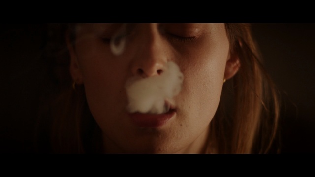 Video Reference: face, nose, lip, cheek, skin, chin, eyebrow, mouth, close up, darkness