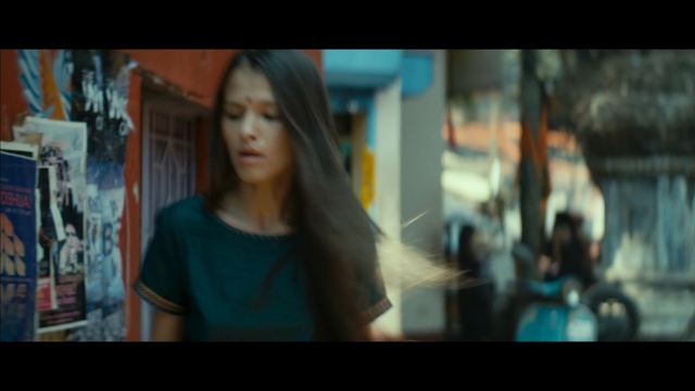 Video Reference: Face, Photograph, Lady, Snapshot, Scene, Human, Fun, Eye, Cool, Black hair, Person, Photo, Woman, Holding, Looking, Man, Young, Standing, Front, Screen, Using, Television, Monitor, Girl, Computer, Laptop, Food, Blue, Shirt, Board, Remote, White, Video, Room, Red, Street, Phone, Screenshot, Human face, Text, Clothing