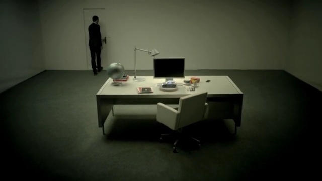 Video Reference: furniture, desk, table, office, technology, angle, interior design, Person