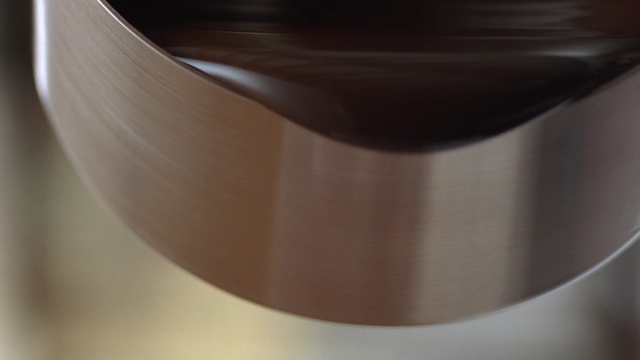 Video Reference: Brown, Close-up, Chocolate, Material property, Caramel color, Metal