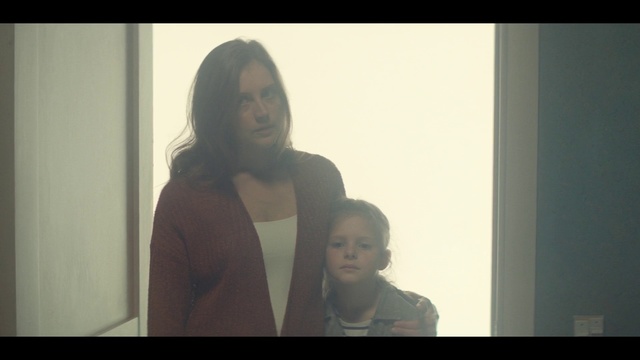 Video Reference: Face, Hair, Photograph, Facial expression, Head, Skin, Standing, Nose, Snapshot, Eyebrow, Person